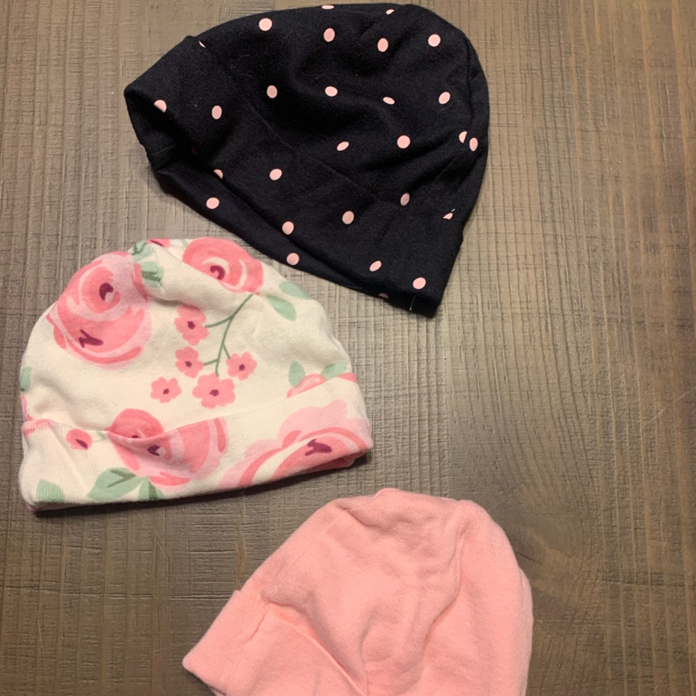 Variety of baby hats, all different sizes